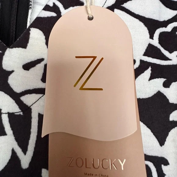 Chic Black and White Floral Jumpsuit - Picture 8 of 8